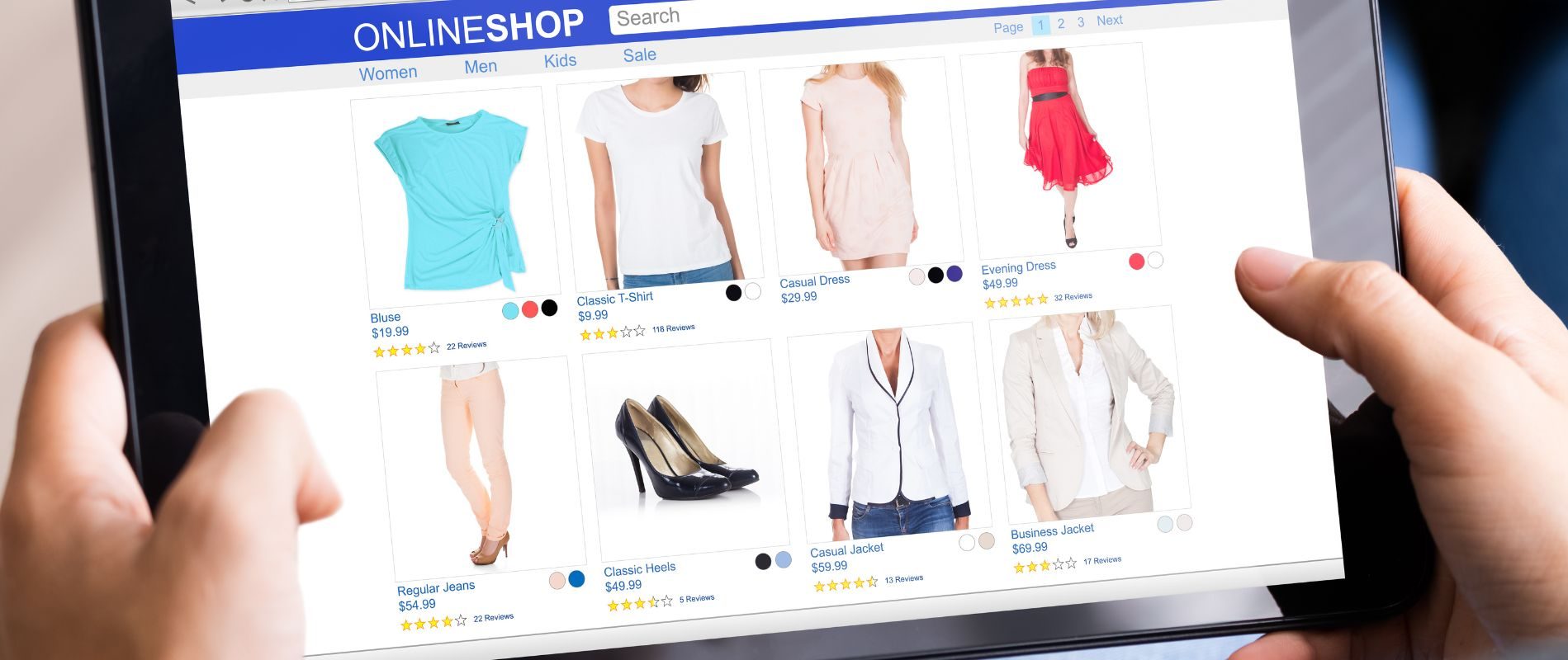 Browsing online shop on a tablet for clothing items including blouses, dresses, t-shirts, jackets, jeans, and heels.