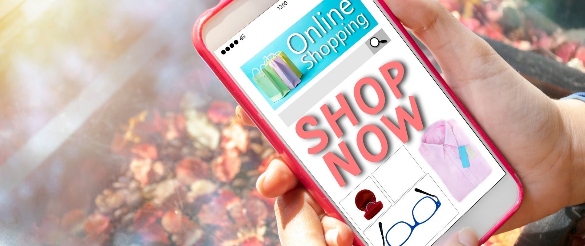 Person using smartphone for online shopping; Shop Now button visible on screen with various product images.