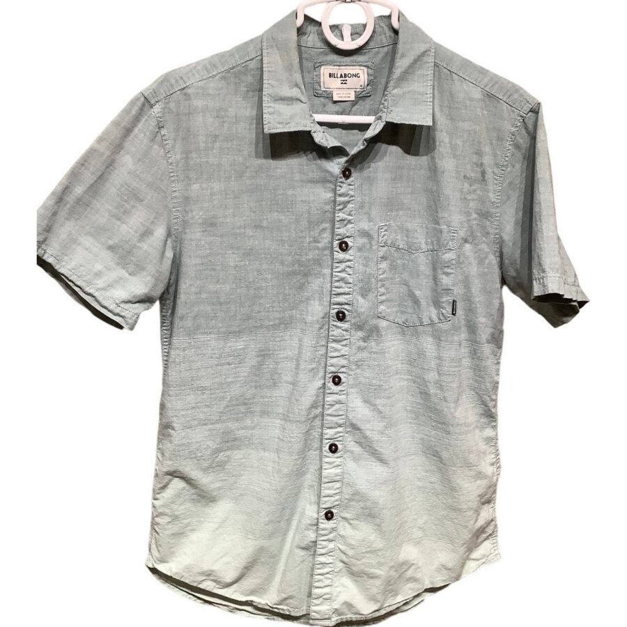 A light blue short-sleeve button-up shirt with a collar, pocket, and subtle texture details, hanging on a white hanger against a plain background.