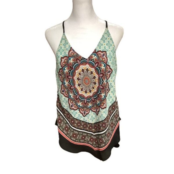 A sleeveless top on a mannequin, featuring a colorful mandala pattern with shades of teal, orange, and red. No landmarks or historical buildings visible.