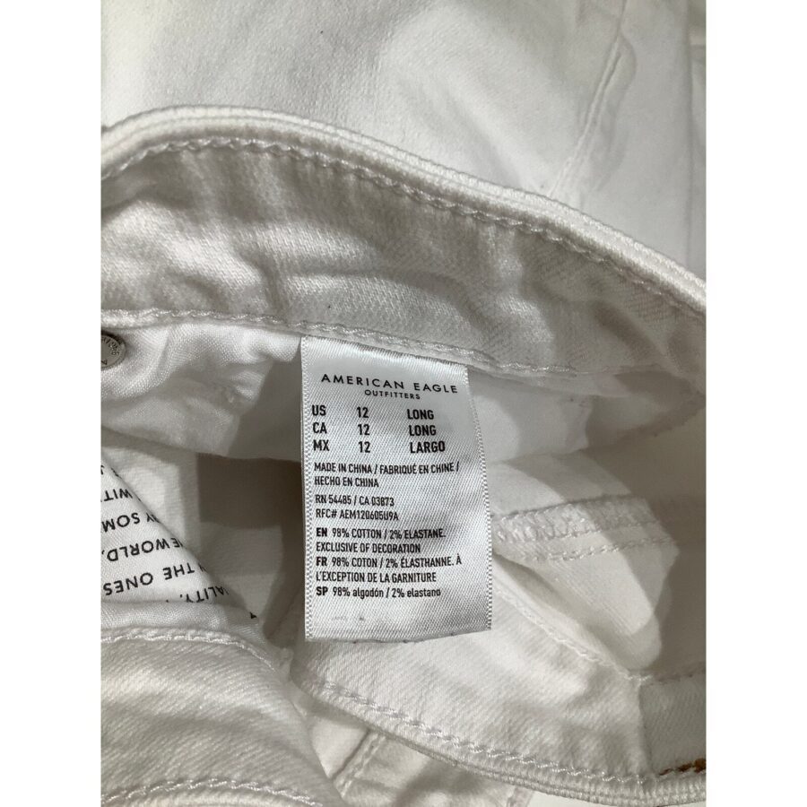 The image shows an inside label of an American Eagle garment, indicating it is a size 12 Long, made of 99% cotton and 1% elastane.