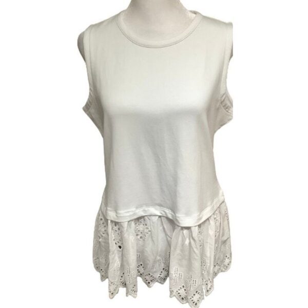 A sleeveless white top with a lace hem, displayed on a mannequin. The upper part is plain, while the bottom features intricate lace detailing.