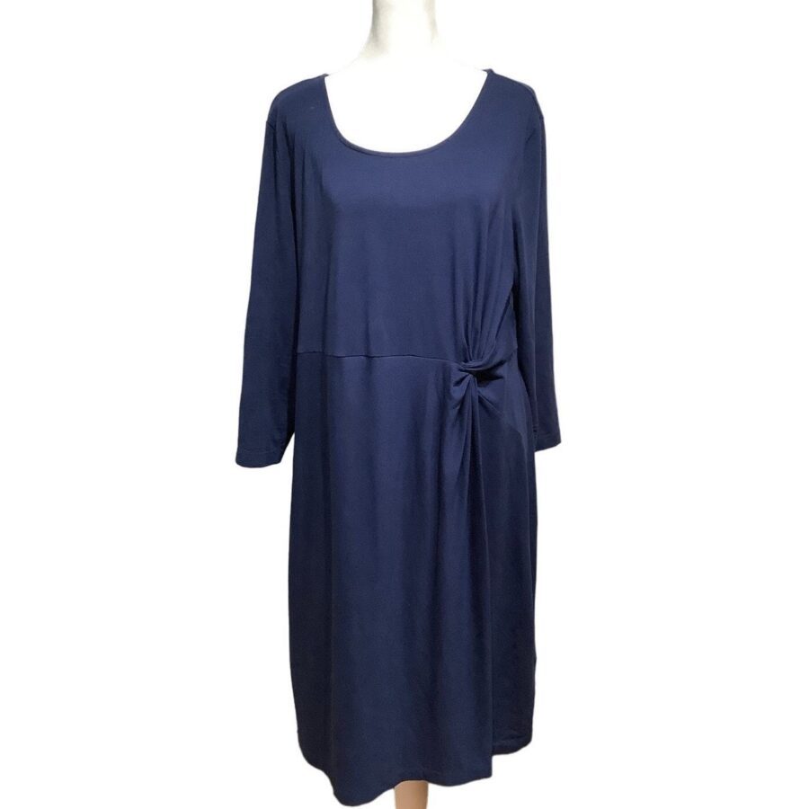 A navy blue, long-sleeved dress with a scoop neckline and side knot detail, displayed on a white mannequin against a plain background.