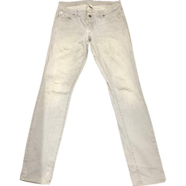 A pair of white jeans laid flat on a plain white background, with visible pockets, button, and belt loops.