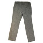 A pair of gray pants is laid flat on a white background. The pants have a button and zip closure, along with side pockets.