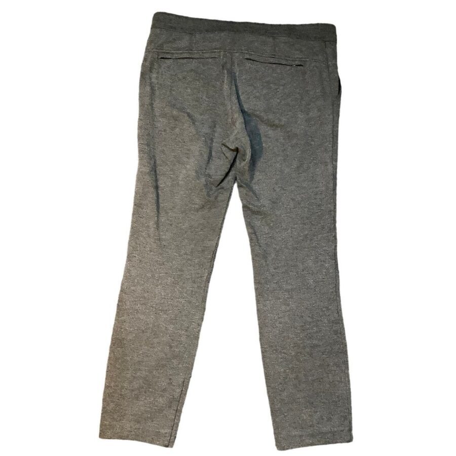 Gray pair of pants displayed flat against a white background, showing the back side with two pockets and no visible landmarks or historical buildings.