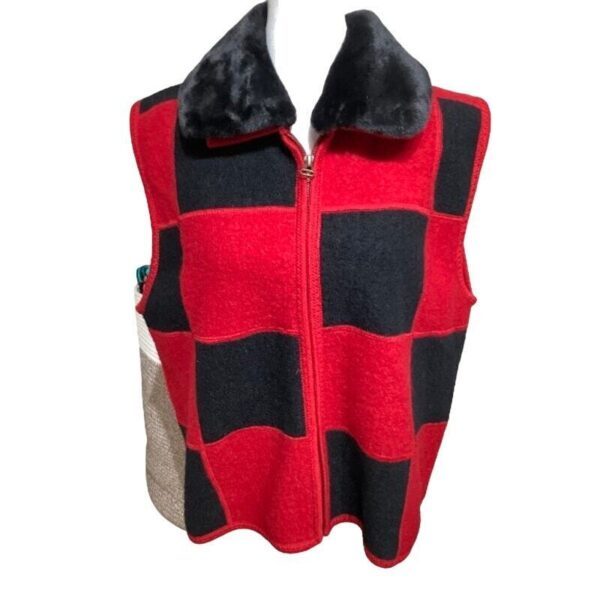 A red and black checkered vest with a black faux fur collar is displayed on a mannequin. It features a front zipper.