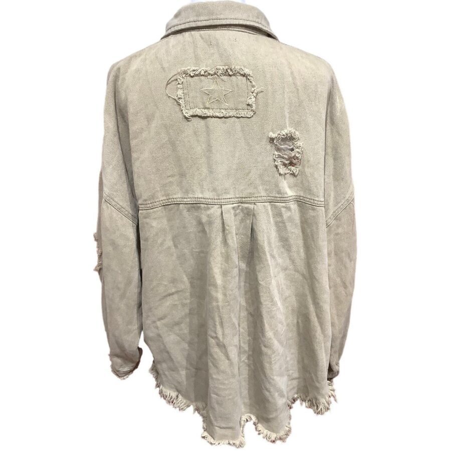 A light-colored, distressed jacket with frayed edges and patches, displayed from the back, showcasing a rugged, worn-out aesthetic.