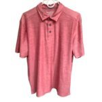 A red Tommy Bahama polo shirt with short sleeves and three buttons is hanging on a hanger against a plain background.