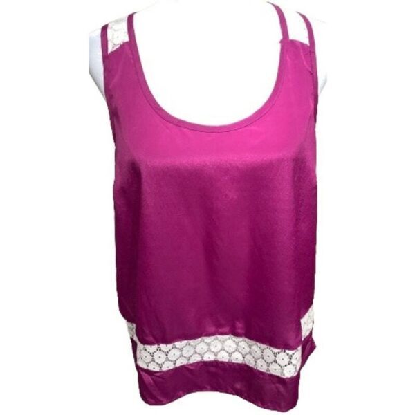 A pink sleeveless top with white lace details on the straps and hem, displayed on a mannequin or hanger.