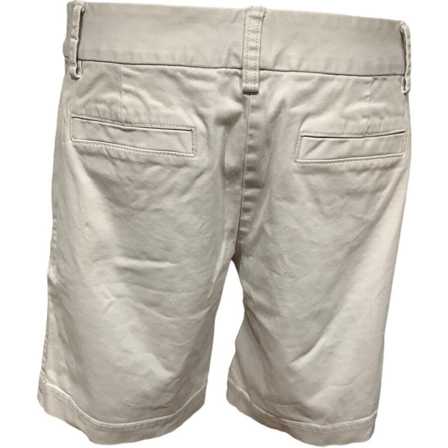 A pair of beige shorts with belt loops and back pockets, displayed against a plain background. The fabric appears to be light and casual.