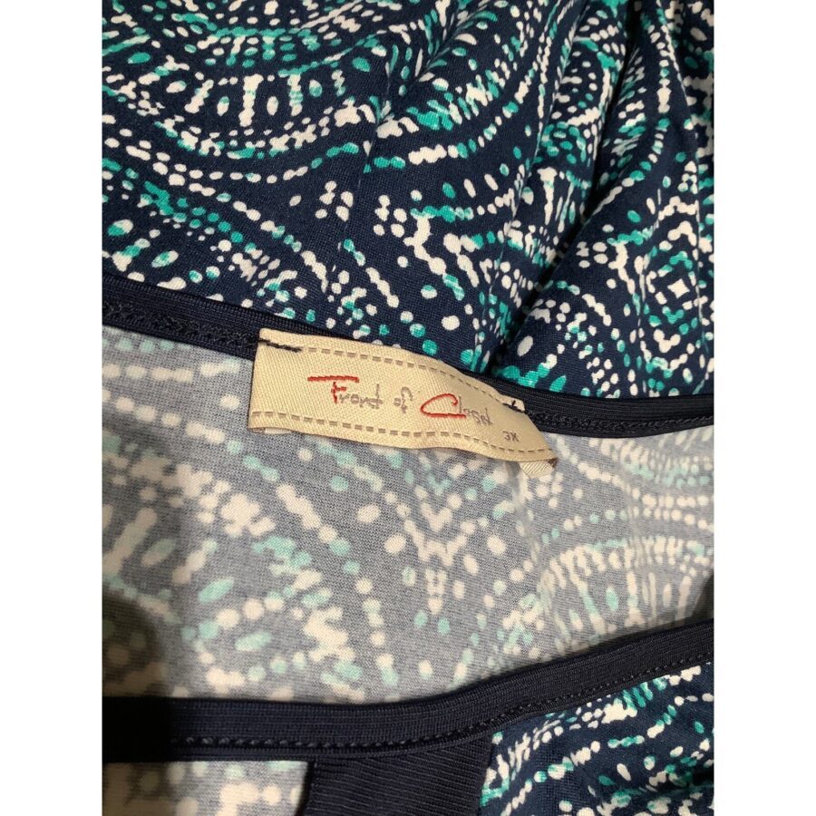 A fabric with a blue and white circular pattern features a label reading "Front of Card" with red text, bordered by a navy trim.