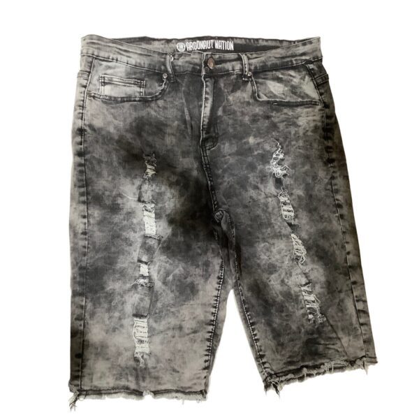 A pair of distressed, grey denim shorts with frayed hems and multiple rips on the front. Top label reads "Aboundant Nation."