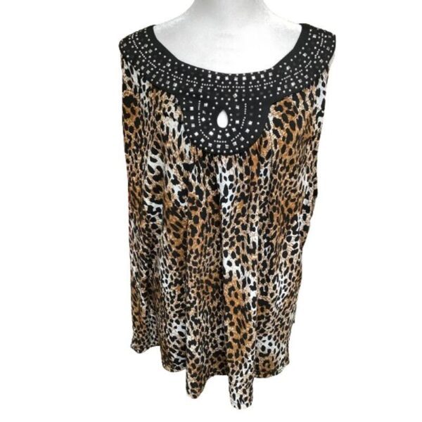 A sleeveless, leopard print top with a black, embellished neckline displayed on a white mannequin torso. No landmarks or historical buildings are visible.