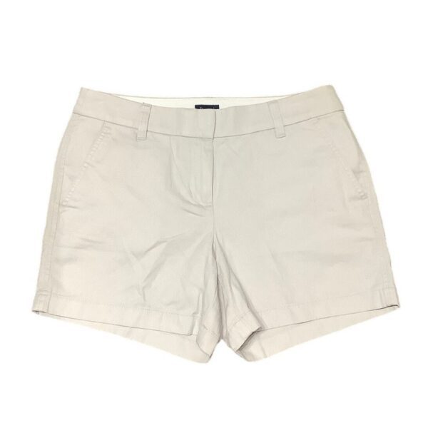 Beige, knee-length shorts with belt loops and side pockets. The fabric appears to be cotton or a cotton blend. Simple, casual style for everyday wear.